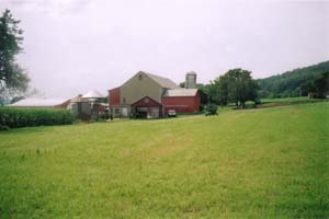 Reunion's present day location.  Taken from the lane as you enter the farm.  It is a shot of a red barn and outbuildings.